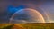 Twilight Splendor: The Mesmerizing Double Rainbow Landscape