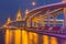 Twilight at Suspension bridge and highway curved