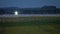 Twilight takeoff over runway