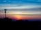 Twilight time of bangkok cityscape with radio pole silhouette