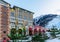 Twilight townscape of Gorky Gorod mountain ski resort. Gorky 960 restaurant entrance view with neon exterior sign at winter on sno