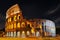 Twilight view of Colosseo in Rome, elliptical largest amphitheatre of Roman Empire ancient civilization, Rome, Italy