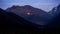 Twilight view of Mussa-Achitara mountain and ski slopes in Dombay