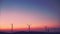 The twilight views of Wind turbines produce electric power. Global warming concept and green energy