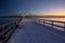 Twilight walk on snow-covered pier, White Rock near Vancouver