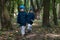 Twin brothers strolling in the woods