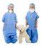 Twin children doctors with teddy bear