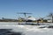 Twin engine aircraft with turboprop power plant under snow in sunny winter day