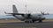 Twin Engine Turboprop Military Cargo Plane Starting Right Engine