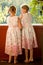 Twin girls in summer dresses