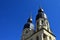 Twin gothic towers of Cathedral Of Saint Nicholas in Trnava, western Slovakia, viewed from southwestern side