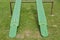 Twin green teeter totters