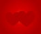 Twin hearts on red background
