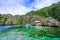 Twin Lagoon on paradise island with sharp limestone rocks, tropical travel destination - Coron, Palawan, Philippines