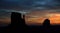 Twin Mittens of Monument Valley Silhouetted at Sunset