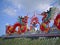 twin red china dragon statue and blue sky