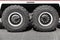 Twin truck wheels on asphalt road