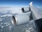 twin turbine jet engines on airplane wing while flying