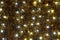 Twinkling christmas lights background. Wall with christmas light