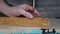 Twist the screw into a wooden block