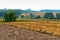 Twisted hay in the field, bundles of hay, fields with twisted haystacks