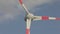 Twisting blades of a wind generator, near shooting blades of a wind generator, wind turbine close-up against the background of clo