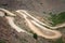 Twisting mountain gravel road in Argentina