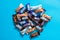 Twix, Milky Way, Snickers, Bounty, Mars popular mini candy chocolate bars on blue background