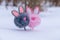 Two abstract rabbit toys on the snow