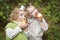 Two Adorable Children Eating Apples Outside