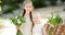 Two adorable young bridesmaids holding beautiful flower bouquets after wedding cemerony outdoors