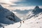 Two adventurers trek across a snow covered mountain in breathtaking solitude