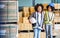 Two African little boy, girl kids standing in warehouse, dream to be architect, engineer, worker or business owner, smiling and