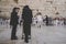 Two aged religious Jewish men stand on the square near the Western Wall and talk. Jerusalem, Israel