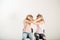 Two aggressive women arguing and shouting isolated on a white background