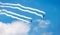 Two airplanes with contrails in the sky