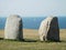 Two Ales Stenar boulders and a white sailboat, Sweden