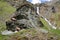 Two Alpine Ibex (Capra Ibex) and the Py Waterfall, located above the hamlet Laisonnay d\\\'en Haut