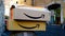 Two Amazon boxes abandoned on a marble block with the distinctive smile logo. the largest e-commerce