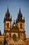 Two ancient towers of Tynsky chram on the Old Town Square (Staromestske namesti) during the sunset
