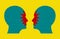 Two Angry Human Heads face To face With the same way of thinking. arguing with angry. Social issue and mental health concept