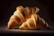 Two appetizing croissants. AI Generated