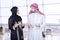 Two Arabian businesspeople talking in airport