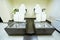 Two armchairs and bathtubs in pedicure cabinet