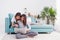 Two asia woman using laptop computer to shopping online and sitting on sofa in living room at home.Leisure digital