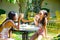 Two Asian Girls in Swimsuit Having Some Meals and Fun Together After Swimming Activities