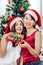 Two Asian girls teen in happiness Christmas New Year Eve moment cellebration present Gift box vertical shot