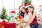 Two Asian girls teen lovely hug in happiness Christmas New Year Eve moment celebration with Gift box