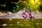 Two asian little child girls playing paper boat in the riverside