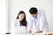 Two asian medical workers Smile. Portrait of asian doctor. Chemists doing in the laboratory. young scientists with test and